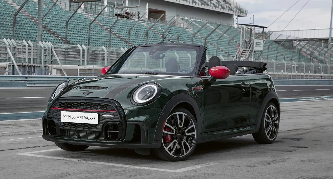 The JCW MINI Convertible zooming on the racetrack. | Ferman MINI of Tampa Bay in Palm Harbor FL